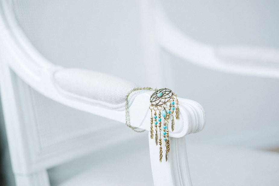 Turquoise dreamcatcher pendant necklace with silver feathers and beads